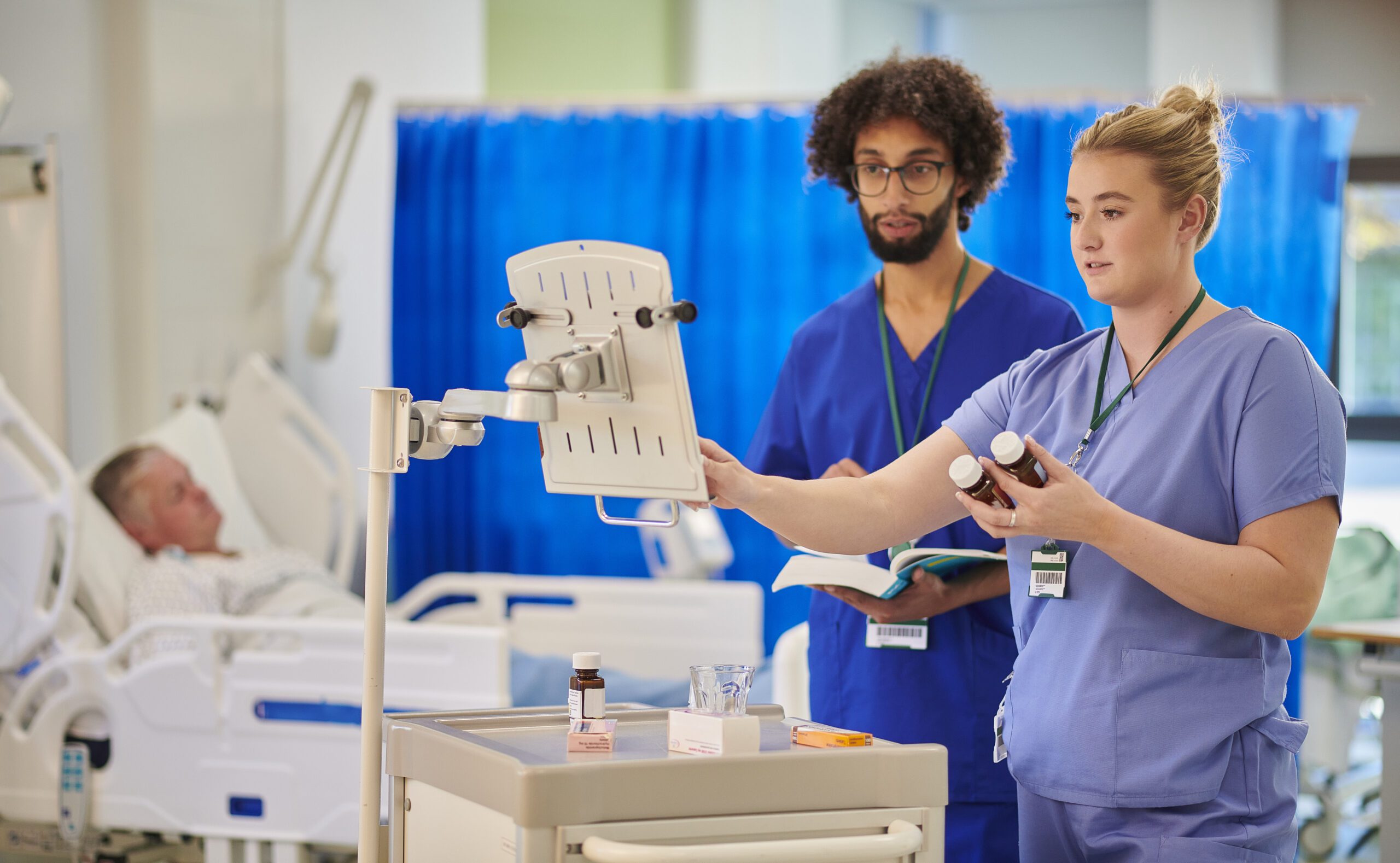 Medical staff reviewing patient records