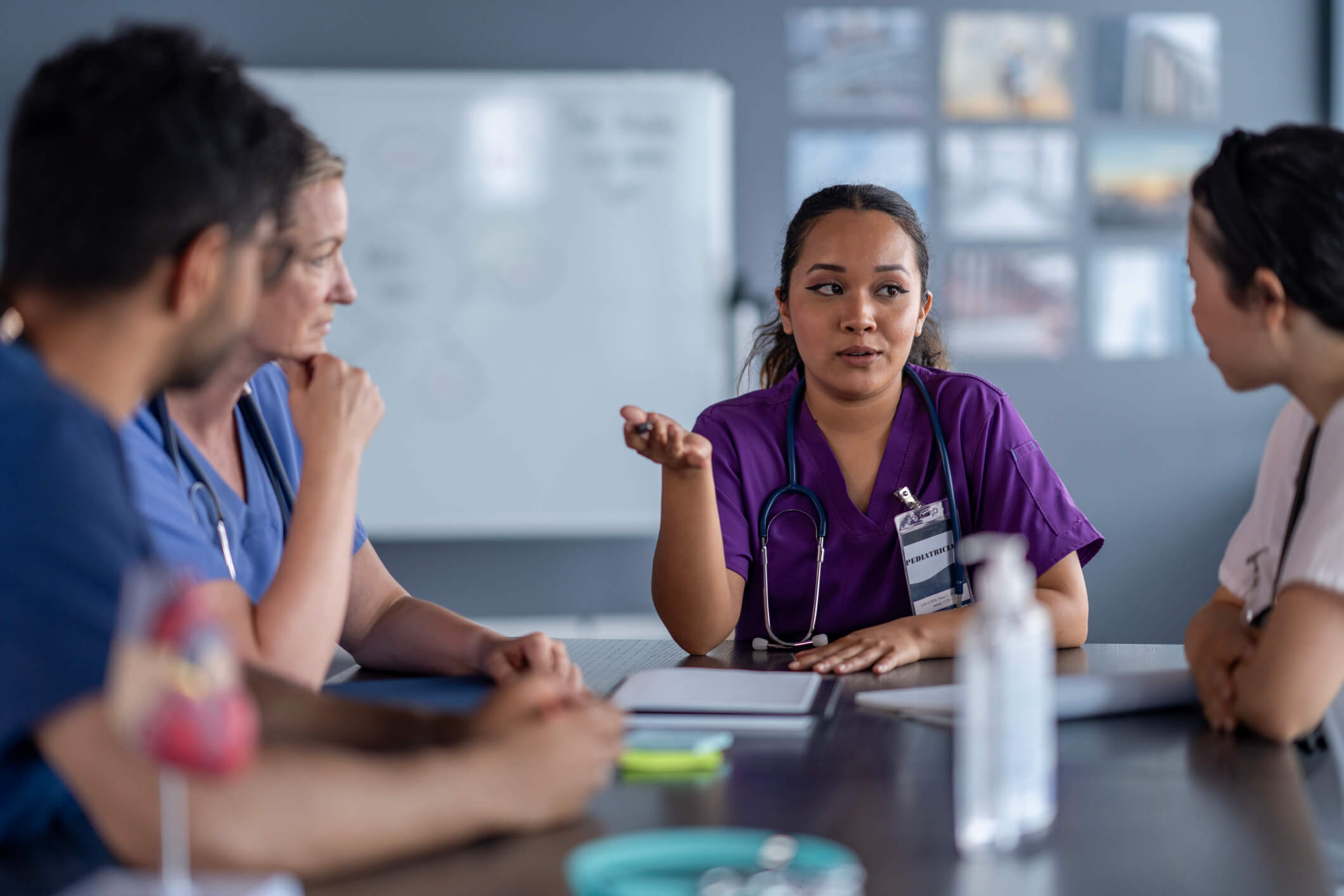 Nurse leading a team discussion