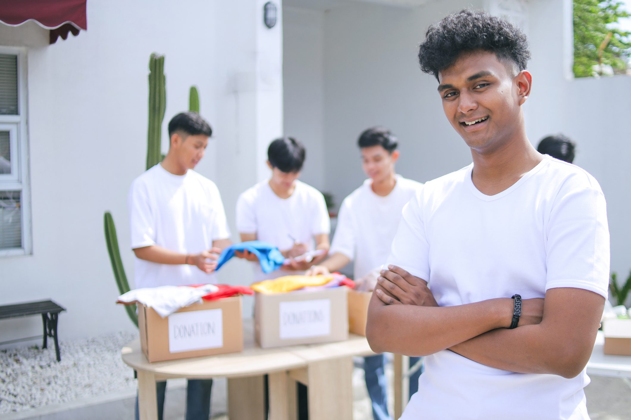 Volunteers sorting donated clothes