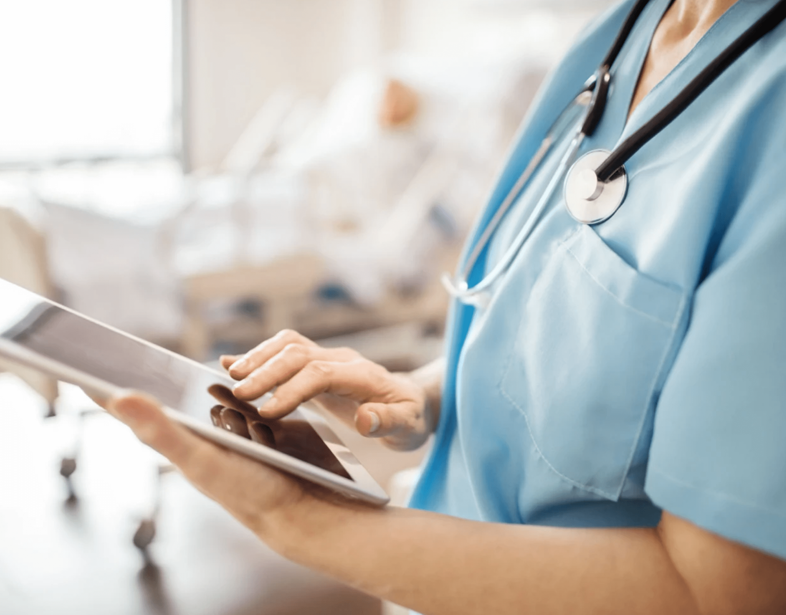 Medical staff with stethoscope and tablet