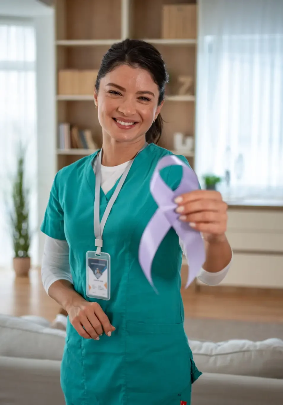 Nurse holding purple awareness ribbon